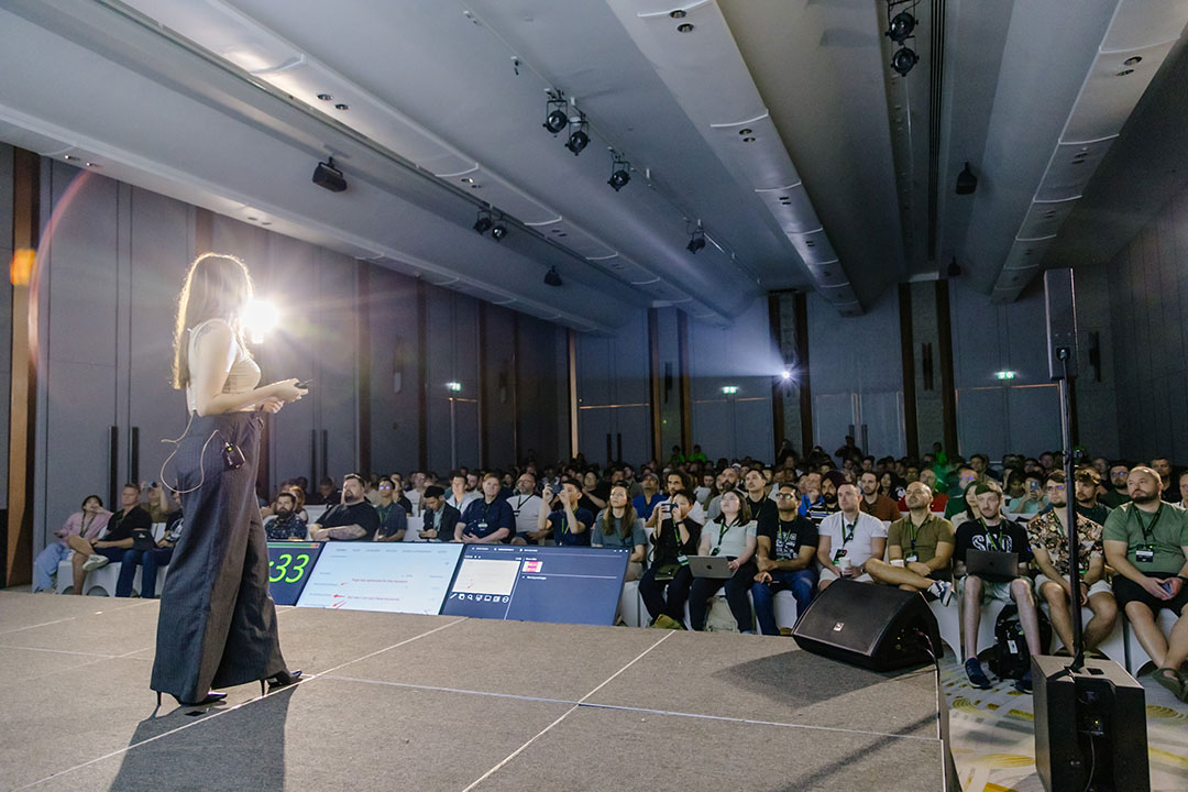 A diverse group of professionals in a conference setting.